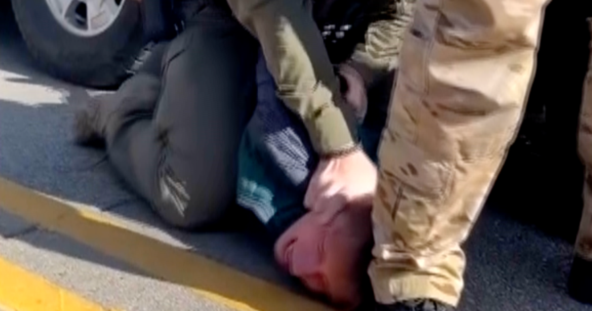 Federal Immigration Agent Punches Restrained Man After Evanston Car Crash Amid Community Backlash