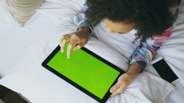 Child on tablet device