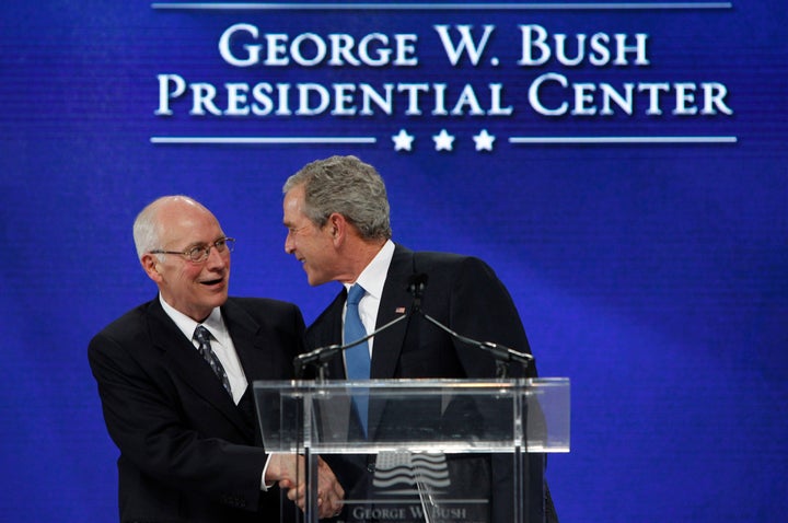 Former President George W. Bush (right) shakes hands with former Vice President Dick Cheney after Cheney introduced Bush during the groundbreaking ceremony for the President George W. Bush Presidential Center in Dallas on Nov. 16, 2010.