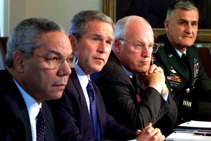 In this Sept. 12, 2001, file photo, (from left) Secretary of State Colin Powell, Bush, Cheney and Chairman of the Joint Chiefs of Staff Gen. Henry Shelton attend a meeting with the National Security Council in the Cabinet Room of the White House.