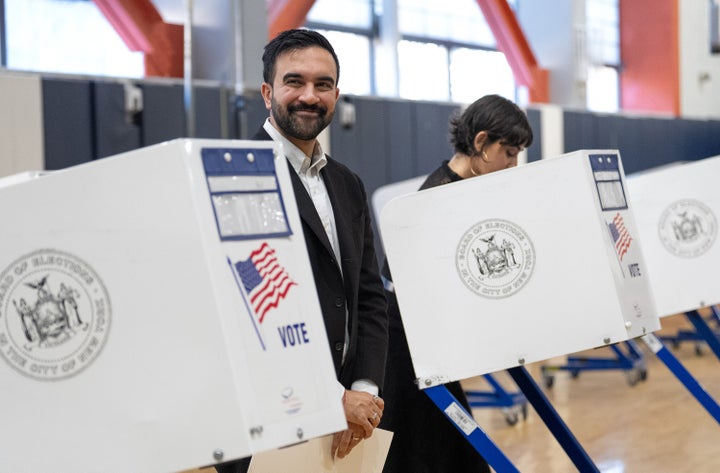 Zohran Mamdani Makes Historical past As New York Metropolis's Subsequent Mayor 1 Democratic mayoral candidate Zohran Mamdani and his wife, Rama Duwaji, vote at Frank Sinatra School of the Arts High School on Tuesday in Queens, New York.