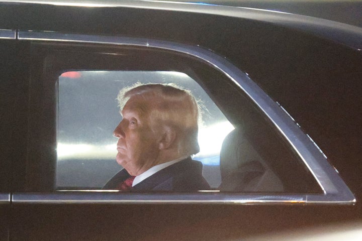 President Donald Trump is seen in his limousine, known as "The Beast," upon his arrival at Joint Base Andrews, Md., Wednesday, Nov. 5, 2025, after giving a speech at the American Business Forum in Miami. (AP Photo/Luis M. Alvarez)