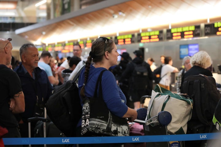 Passengers navigate busy terminals at LAX as the ongoing government shutdown leaves thousands of air traffic controllers working without pay in Los Angeles, California, on November 5, 2025. (Photo by Grace Hie Yoon/Anadolu via Getty Images)