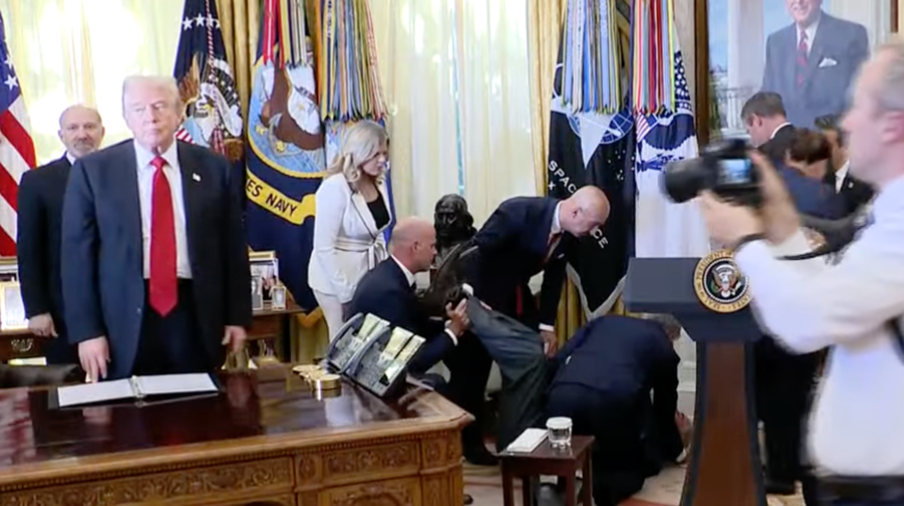 Shocking Oval Office Incident: Man Collapses During Presidential Address, Press Escorted Out