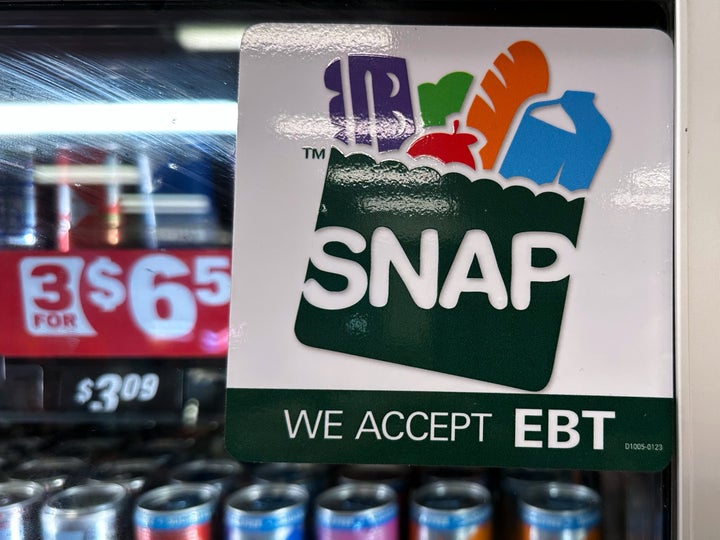 SNAP EBT information sign is displayed at a gas station in Riverwoods, Ill., Saturday, Nov. 1, 2025. (AP Photo/Nam Y. Huh, file)