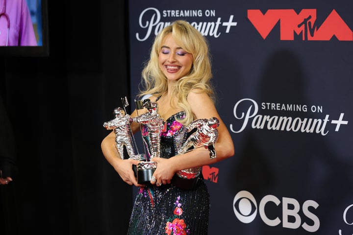 Sabrina Carpenter, posing with an armful of MTV Video Music Awards back in September, was tapped with six Grammy nominations.