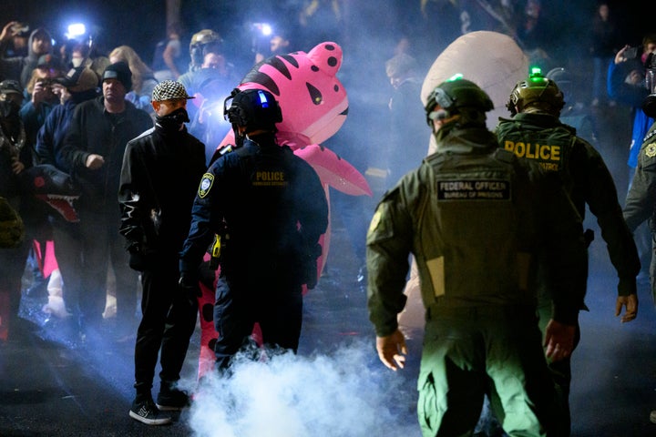 PORTLAND, OREGON - OCTOBER 18: Anti-I.C.E. protesters clash with federal agents at the U.S. Immigration and Customs Enforcement building on October 18, 2025 in Portland, Oregon. (Photo by Mathieu Lewis-Rolland/Getty Images)