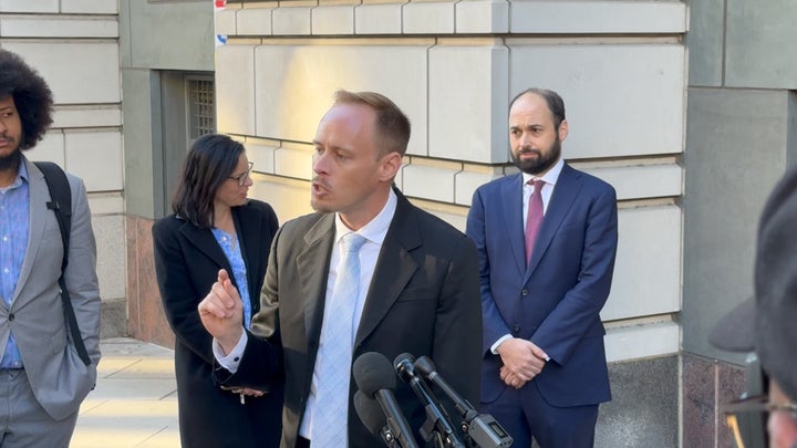 Sean Dunn speaks outside the courthouse following his acquittal.