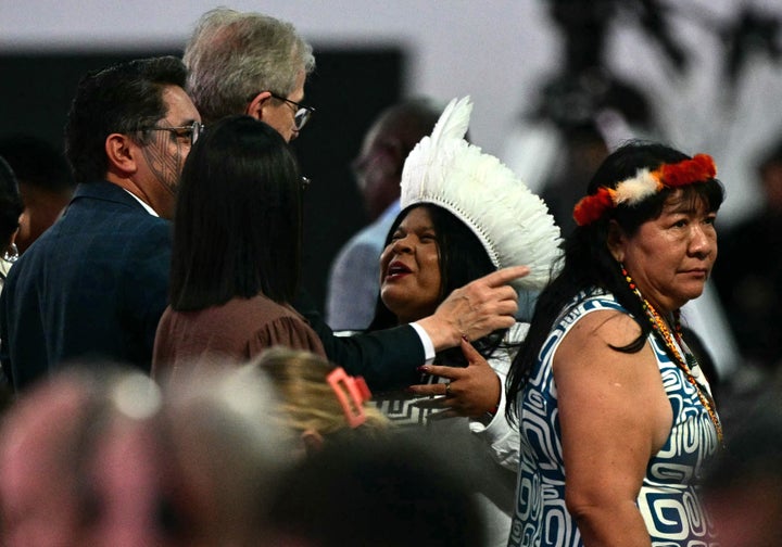 Local weather Summit Opens With A Easy However Tough Plea For International locations 2 Brazilian Minister for Indigenous Peoples Sonia Guajajara (C) greets attendees at the COP30 UN Climate Change Conference following the opening ceremony in the Amazon city of Belem, Brazil on Nov. 10, 2025. Indigenous leaders attending the summit have demanded more say in how their territories are managed amid escalating climate change.