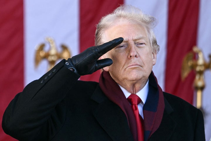 President Donald Trump salutes at the conclusion of a Veterans Day ceremony at Arlington National Cemetery in Arlington, Virginia, on Nov. 11, 2025.
