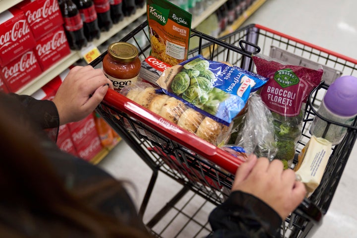 Jaqueline Benitez, who depends on California's SNAP benefits to help pay for food, shops for groceries at a supermarket in Bellflower, California, on Feb. 13, 2023. 