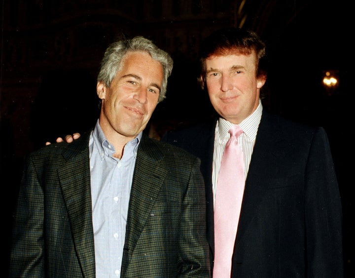 Jeffrey Epstein and Donald Trump pose together at the Mar-a-Lago estate, Palm Beach, Florida on February 22, 1997. (Photo by Davidoff Studios/Getty Images)