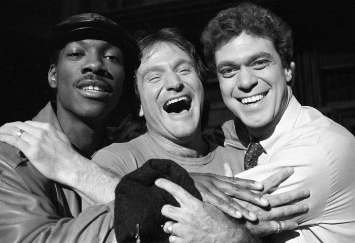 Eddie Murphy, left, and Robin Williams, middle, with Joe Piscopo, right, on a 1984 “Saturday Night Live” episode.