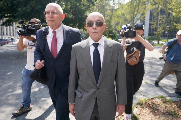 Trump pardons British billionaire who admitted participating in insider trading scheme 1 British billionaire Joe Lewis, center, photographed leaving Manhattan federal court in July 2023.