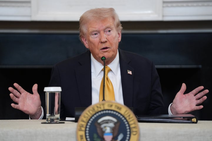 FILE - President Donald Trump answers questions from reporters during a roundtable on criminal cartels in the State Dining Room of the White House, Oct. 23, 2025, in Washington. (AP Photo/Evan Vucci, File)