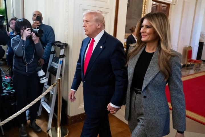 The Trumps arrive to sign an executive order on foster children and families in the East Room of the White House in Washington, D.C., Nov. 13, 2025.