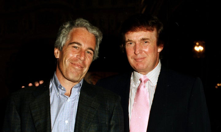 Jeffrey Epstein (left) and Trump pose together at the Mar-a-Lago estate, Palm Beach, Florida, on Feb. 22, 1997.