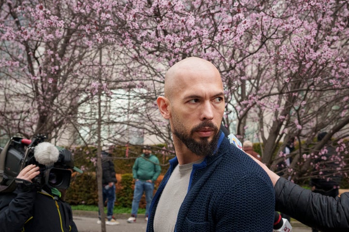 Andrew Tate leaves the Bucharest Tribunal in Bucharest, Romania, Friday, March 15, 2024. (AP Photo/Andreea Alexandru)