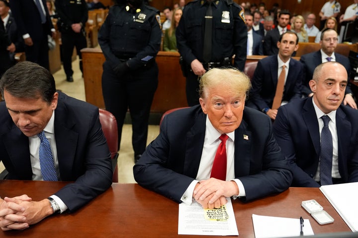 Flanked by his lawyers Todd Blanche, left, and Emil Bove, right, Donald Trump awaits the start of the trial at Manhattan Criminal Court on May 28, 2024, in New York. Blanche is now a deputy U.S. attorney general and Bove has a lifetime seat on the U.S. Court of Appeals for the Third Circuit.