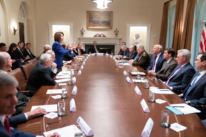 President Donald Trump meets with House Speaker Nancy Pelosi and congressional leaders in the Cabinet Room of the White House on October 16, 2019. Pelosi later said Trump referred to her as a 