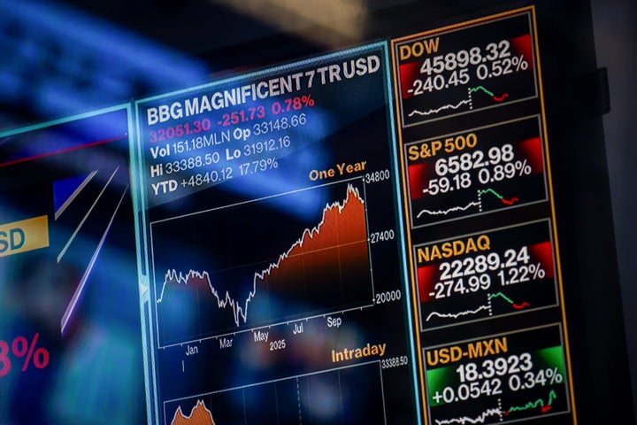 A television broadcasts crypto market news at the Nasdaq MarketSite in New York, US, on Thursday, Nov. 20, 2025. (Michael Nagle/Bloomberg via Getty Images)