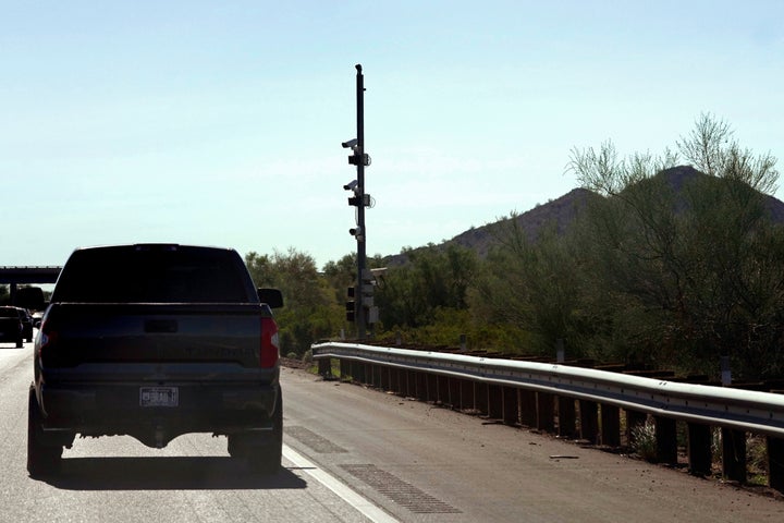 A license plate reader used by U.S. Border Patrol sits along Interstate 10, Tuesday, Oct. 21, 2025, in Sacaton, Ariz. (AP Photo/Ross D. Franklin)