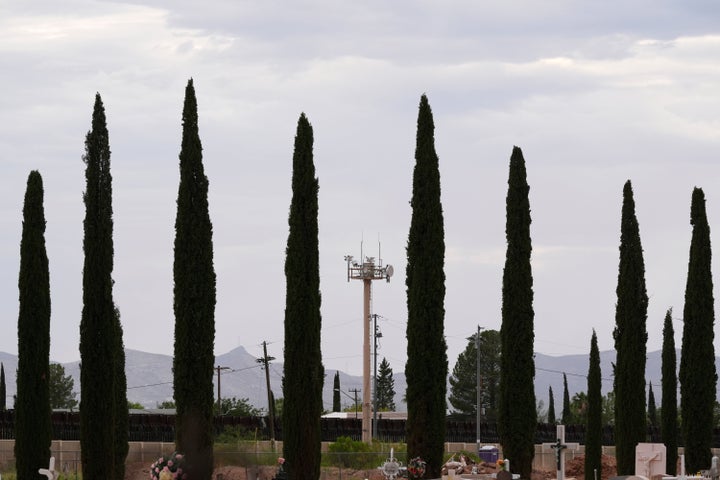 Surveillance technology used by various law enforcement jurisdictions sit on a tower at the border wall, Monday, July 28, 2025, in Douglas, Ariz. (AP Photo/Ross D. Franklin)