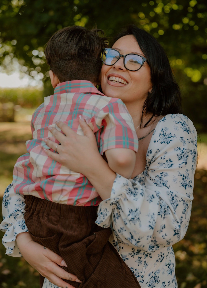 The author hugs her youngest son.