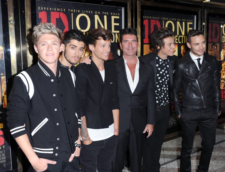 Simon Cowell with One Direction in 2013