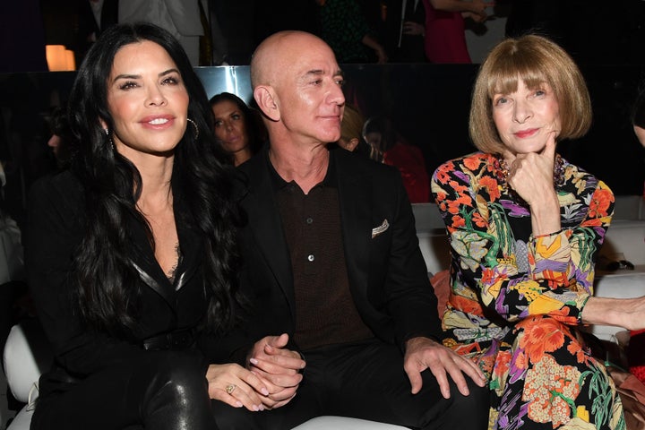 Lauren Sanchez, Amazon CEO Jeff Bezos and Anna Wintour attend the Tom Ford AW20 Show at Milk Studios on Feb. 7, 2020, in Hollywood, California.