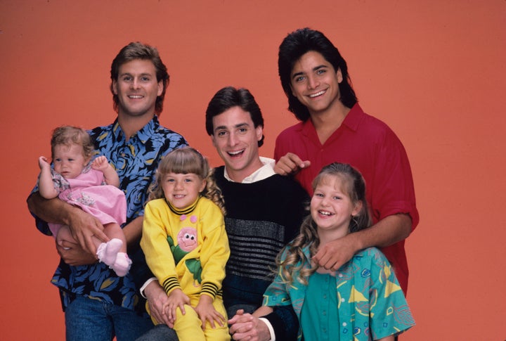 The cast of the family sitcom "Full House" in 1987 featuring Bob Saget (Danny), center, Michelle (played by twins Mary Kate/ Ashley Olsen), Stephanie (Jodie Sweetin) and D.J. (Candace Cameron), Joey Gladstone (Dave Coulier, left) and Jesse (John Stamos).