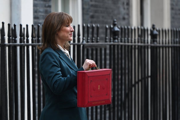 Rachel Reeves poses on the doorstep of 11 Downing Street ahead of the Budget.