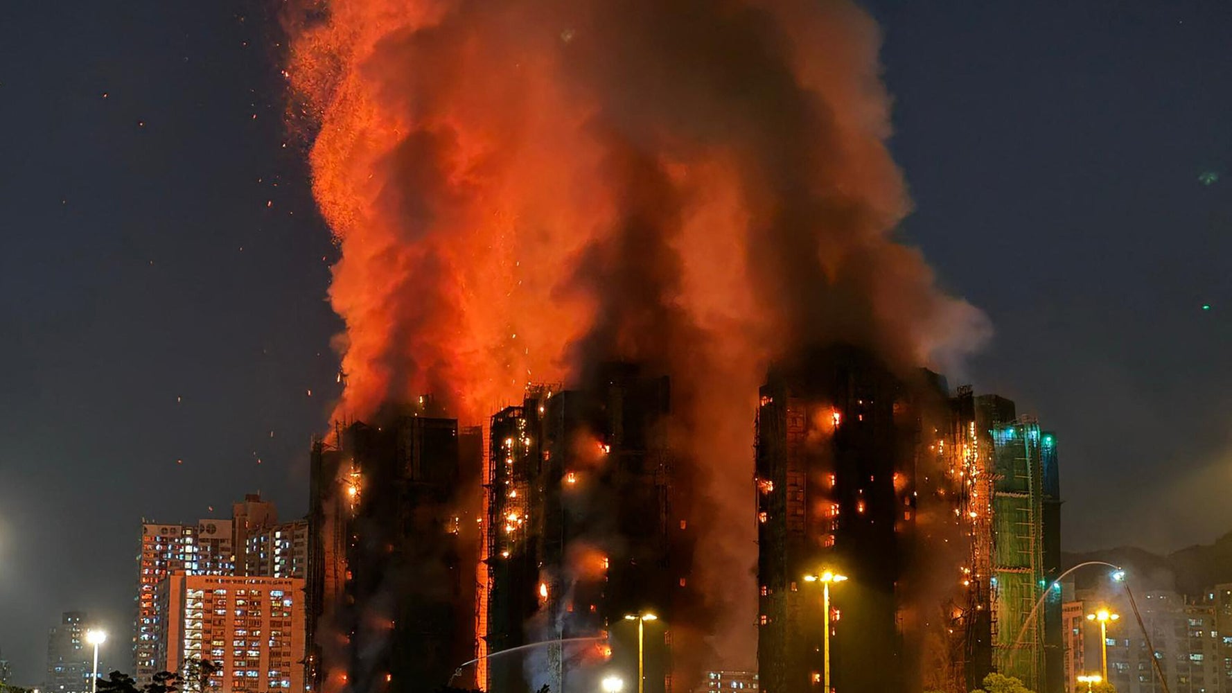 Hong Kong Fire Kills 13, Traps Residents in Tai Po Apartment Blaze