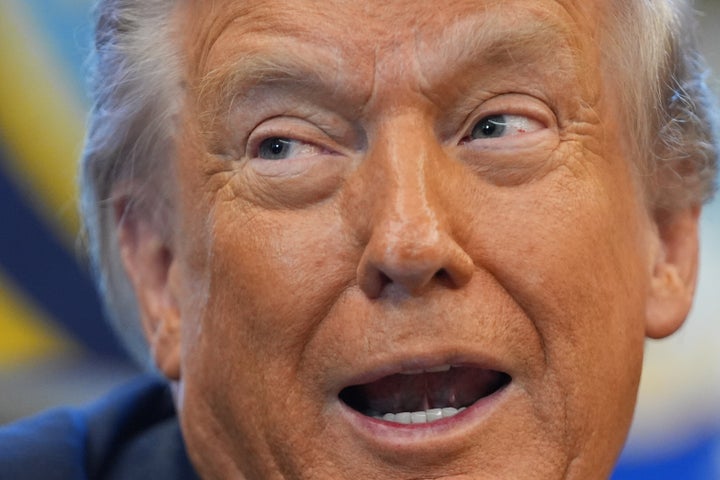 President Donald Trump answers questions from reporters during a meeting with the White House task force on the 2026 FIFA World Cup in the Oval Office of the White House, on Nov. 17, 2025, in Washington.
