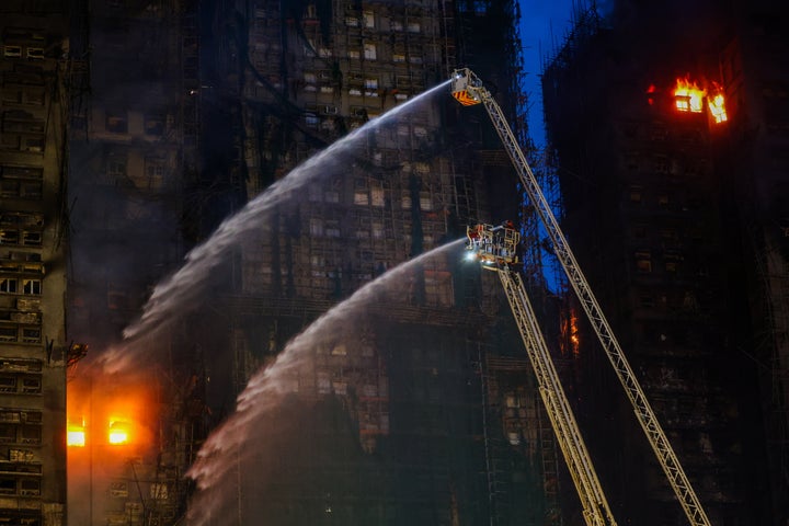 At Least 94 Lifeless As Hong Kong Firefighters Battle Burning Towers For A Second Day 1 Rescue efforts continue at the Wang Fuk Court residential buildings, in Tai Po, Hong Kong, on November 27, 2025. (Photo by Daniel Ceng/Anadolu via Getty Images)