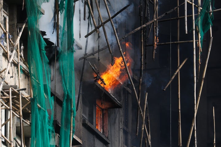 At Least 94 Lifeless As Hong Kong Firefighters Battle Burning Towers For A Second Day 4 Fire persists at several apartments as rescue efforts continue at the Wang Fuk Court residential buildings, in Tai Po, Hong Kong, on November 27, 2025. (Photo by Daniel Ceng/Anadolu via Getty Images)