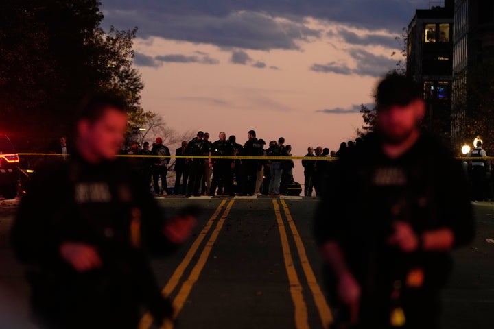 Emergency personnel keep a presence following the shooting of two National Guard soldiers near the White House, Wednesday, Nov. 26, 2025, in Washington. (AP Photo/Mark Schiefelbein)