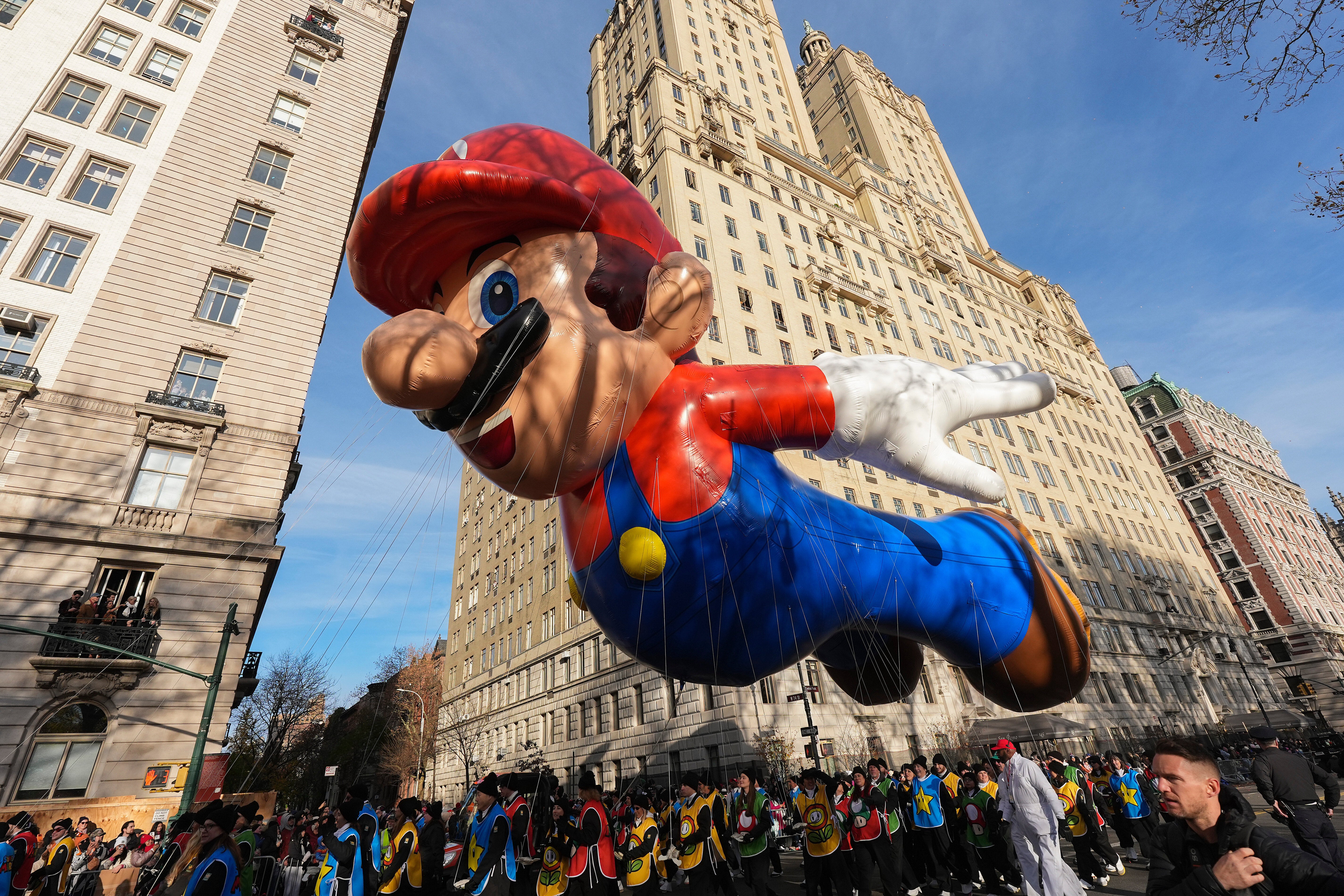 The Mario balloon floats down Central Park West during the Macy's Thanksgiving Day Parade, Thursday, Nov. 27, 2025, in New York. (AP Photo/Frank Franklin II)