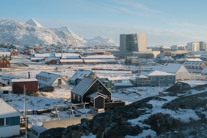 Painted houses and residential apartment blocks in Nuuk, Greenland, on Nov. 3, 2025.