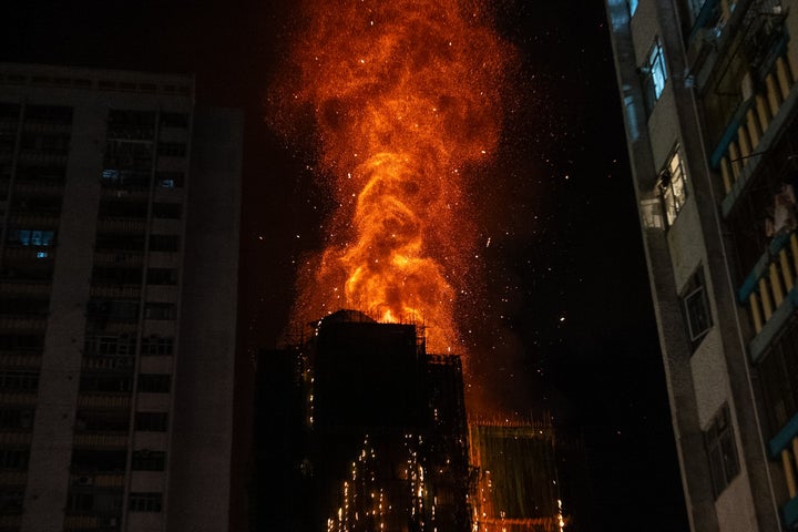 Flames engulf a building after a fire broke out at Wang Fuk Court, a residential estate in the Tai Po district of Hong Kong's New Territories, on Nov. 26 2025.