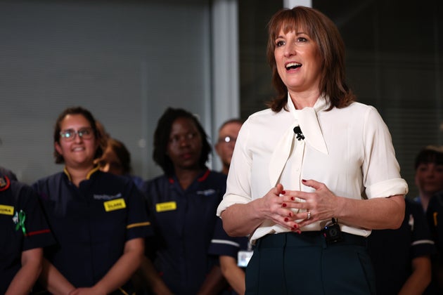 Britain's Chancellor of the Exchequer Rachel Reeves speaks to nurses and members of the media during a visit to University College London Hospital in London, Wednesday, Nov. 26, 2025. (Adrian Dennis/Pool Photo via AP)