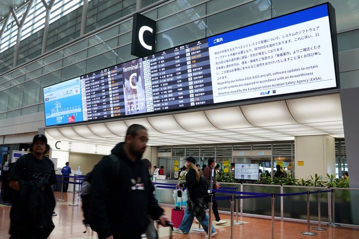 Airways Work To Repair Software program Glitch On Extensively Used Business Plane 2 A bulletin board at the All Nippon Airways (ANA) check-in lobby shows a notice that a software upgrade was required for the airline's Airbus A321/A320 aircraft, which would result in delays and cancellations of flights, at Haneda Airport in Tokyo on November 29, 2025. (Photo by Kazuhiro NOGI / AFP via Getty Images)