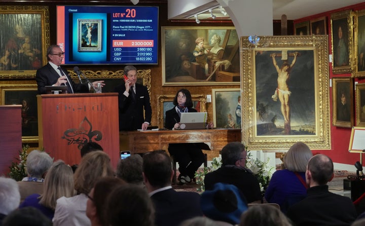 Centuries-Misplaced Rubens Discovered In A Paris Dwelling Sells For An Eye-Watering Sum 6 Auction officer Jean-Pierre Osenat gestures as the long-lost painting "Crucifixion of Jesus Christ" by Baroque master Peter Paul Rubens was sold at auction for 2.3 million euros.