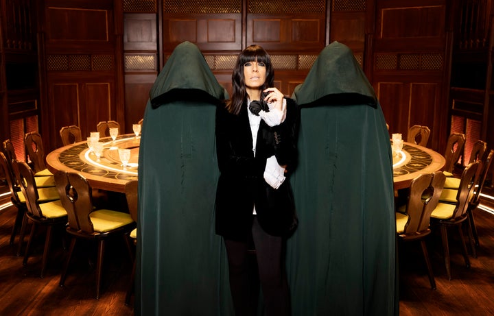 Claudia Winkleman in the iconic Traitors castle's round table room