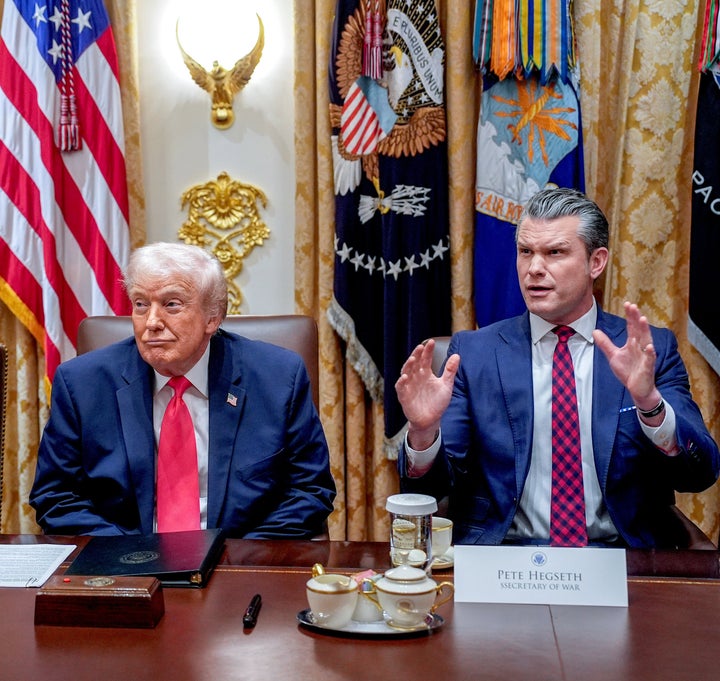 President Donald Trump and Secretary of Defense Pete Hegseth during a Cabinet meeting at the White House on December 2, 2025.