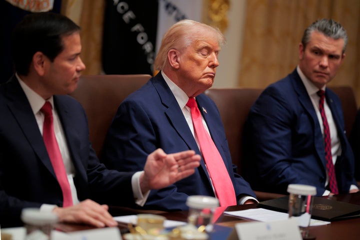 U.S. Secretary of State Marco Rubio (L) speaks as U.S. President Donald Trump and U.S. Secretary of Defense Pete Hegseth sit to his right during a Cabinet meeting in the White House on Tuesday in Washington, D.C.