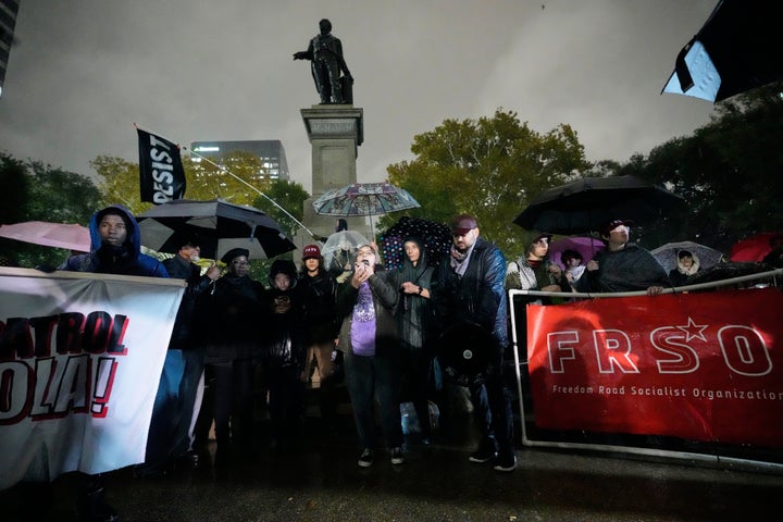 Blu DiMarco, of the Queer and Trans Community Action Project, speaks at a protest against an impending Customs and Border Patrol immigration crackdown effort in New Orleans, Dec. 1, 2025.