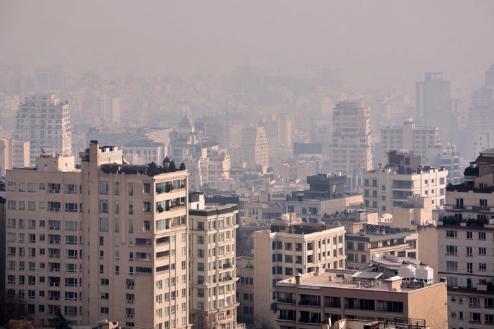 Buildings are blanketed with a high air pollution in Tehran, Iran, on Dec. 7, 2025.