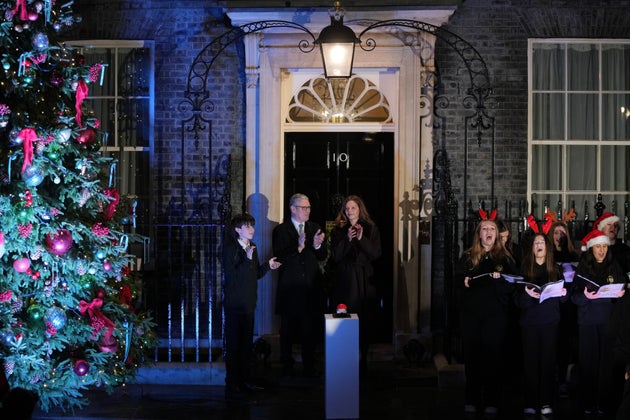 Social media influencer Samuel Salamone with Keir Starmer and his wife Victoria switch on the Christmas tree lights at 10 Downing Street last Monday.