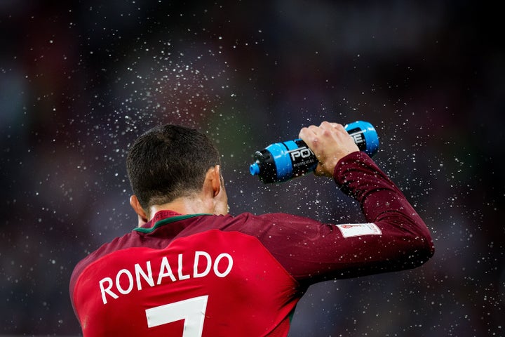 KAZAN, RUSSIA - JUNE 28: Cristiano Ronaldo of Portugal drinks water during FIFA Confederations Cup Russia semi-final match between Portugal and Chile at Kazan Arena on June 28, 2017 in Kazan, Russia. (Photo by Joosep Martinson - FIFA/FIFA via Getty Images)